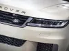 View on front of Range Rover. Detail and part of vehicle